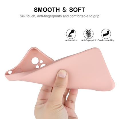 Pink liquid silicone phone case with raised cutouts and soft grip texture