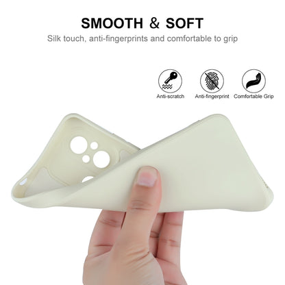 Beige liquid silicone phone case with smooth matte finish, held in hand