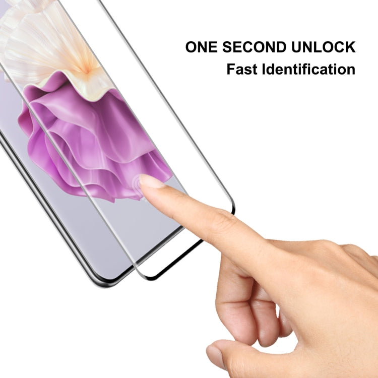 Tempered glass screen protector installation with fingertip smoothing over the screen