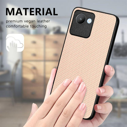 Tan woven back phone case with black bumper and camera cutout