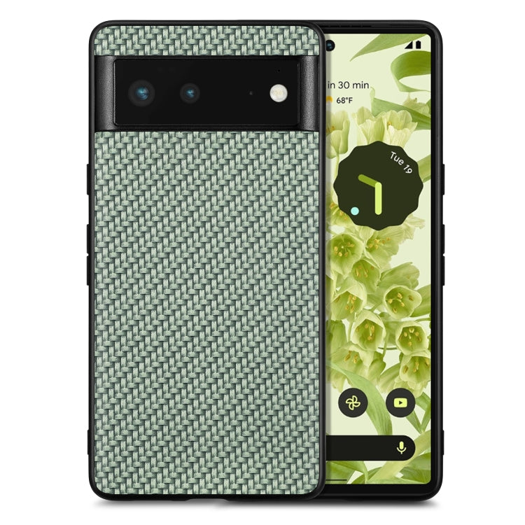 Muted green textured leather back phone case with carbon-fiber pattern and camera cutout