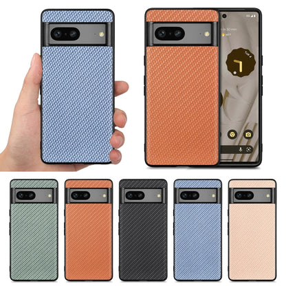 Handheld phone cases with textured backs in blue, brown, green, orange, black, and beige.