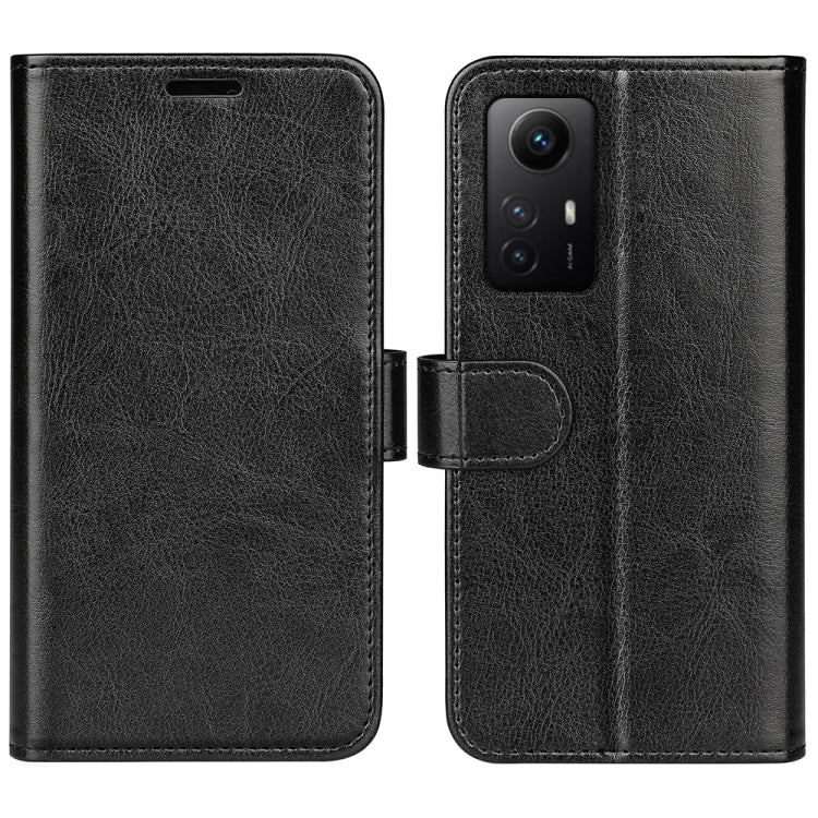 Black leather flip phone case with textured finish and cutouts for camera and ports
