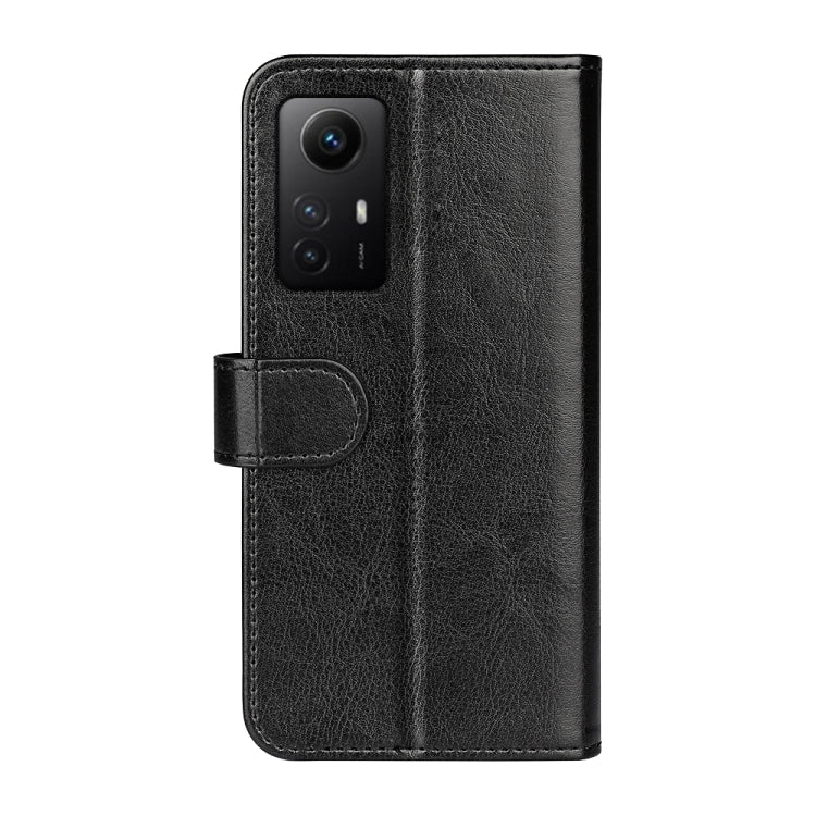 Black leather flip phone case with camera cutout and side flip strap
