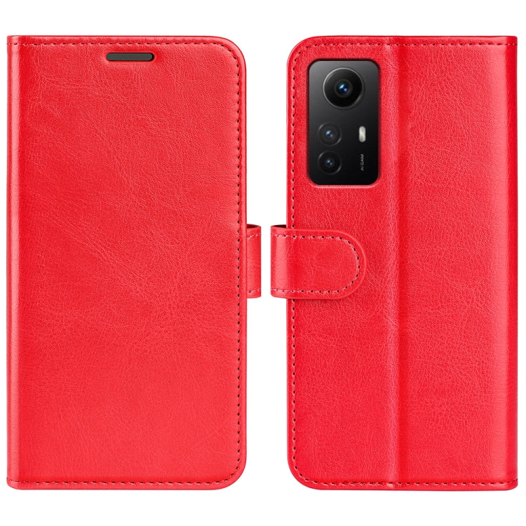 Red leather flip phone case with textured finish and camera cutout with side strap