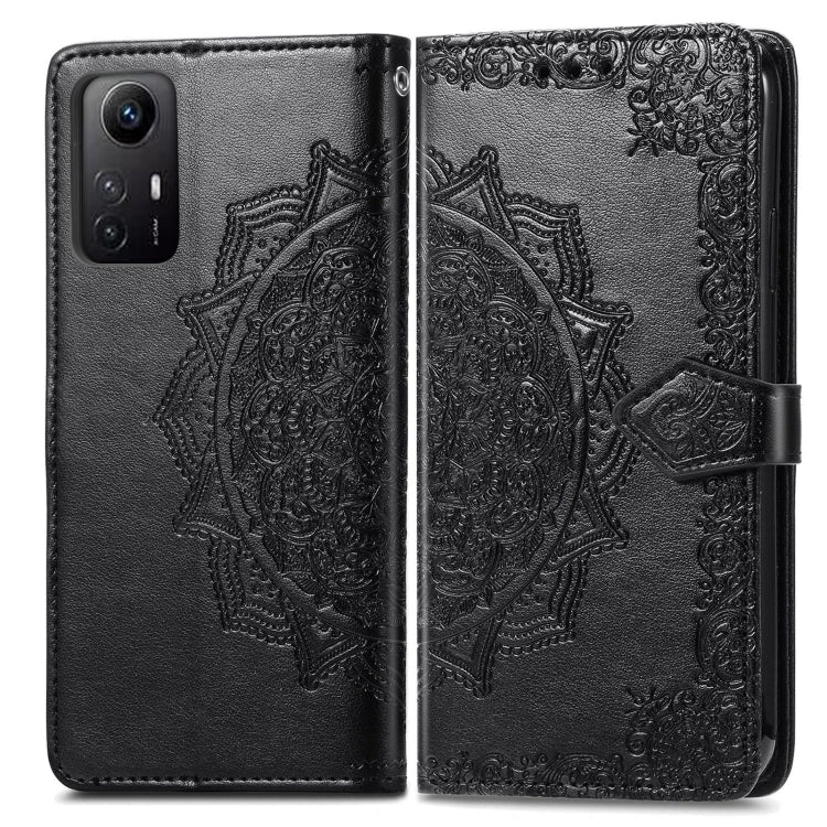 Black embossed mandala leather phone case, open front with magnetic closure band