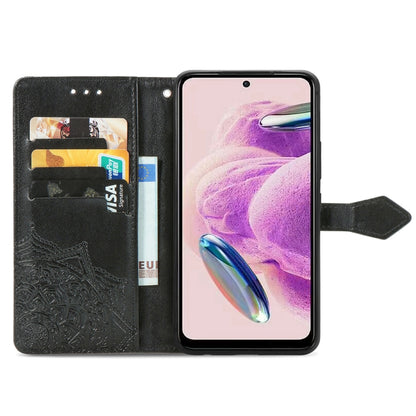 Pink embossed mandala leather phone case with card slots and fold-out holder