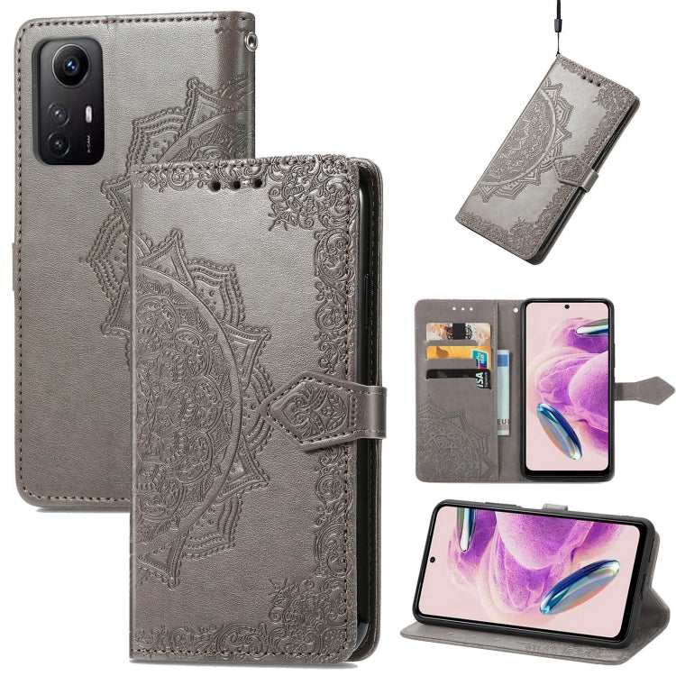 Gray embossed mandala leather phone case with fold-over cover and magnetic strap