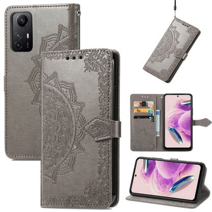 Gray embossed mandala leather phone case with fold-over cover and magnetic strap