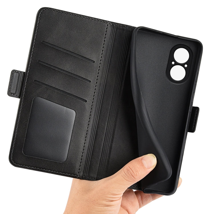 Black leather flip phone case interior with card slot pockets, held open by hand