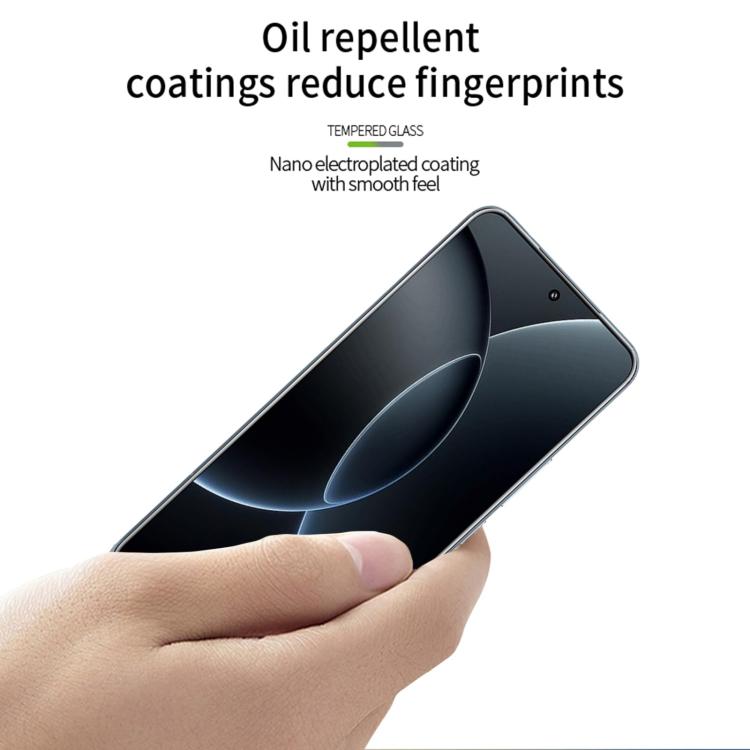 MOFI tempered glass screen protector film, clear, held in hand over phone