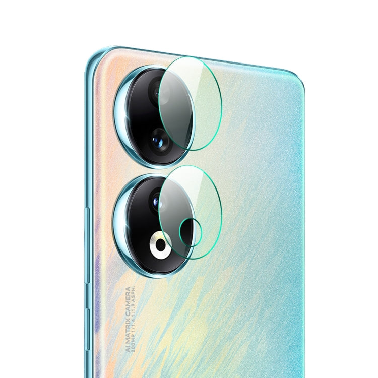 Rear camera lens tempered glass film applied to blue phone back, covering dual lenses