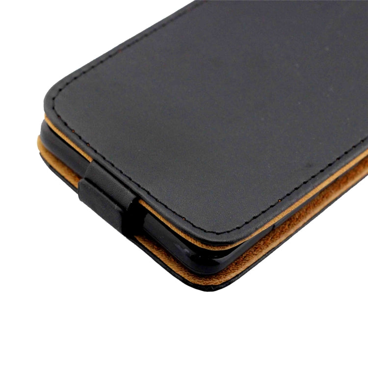 Vertical flip leather phone case, dark gray cover close-up with tan inner backing