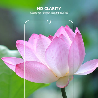 Clear tempered glass screen protector over a smartphone display