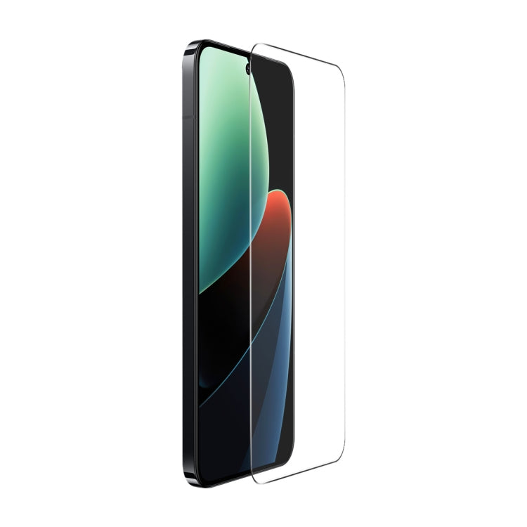 Tempered glass screen protector film on the side of a smartphone