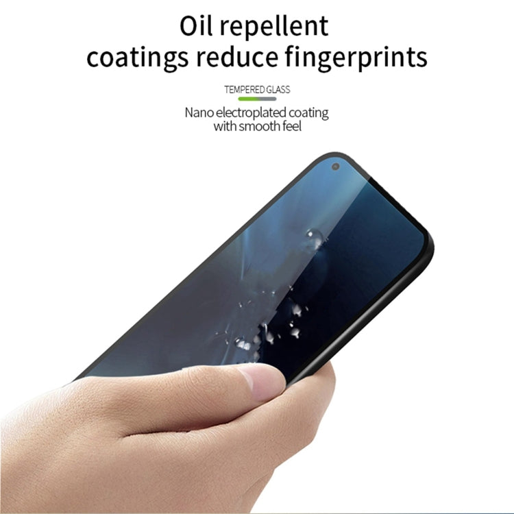 Oil-repellent tempered glass screen protector with fingerprint-reducing coating