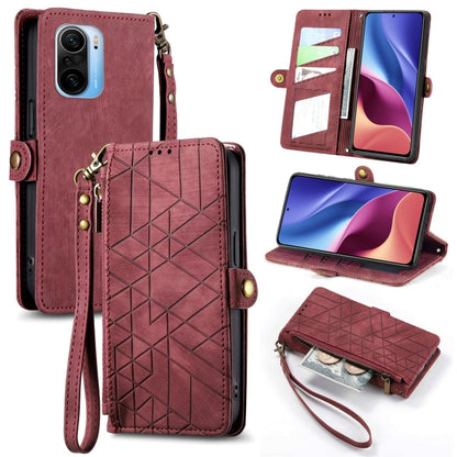 Burgundy leather phone case wallet with geometric pattern, zipper, and wrist strap
