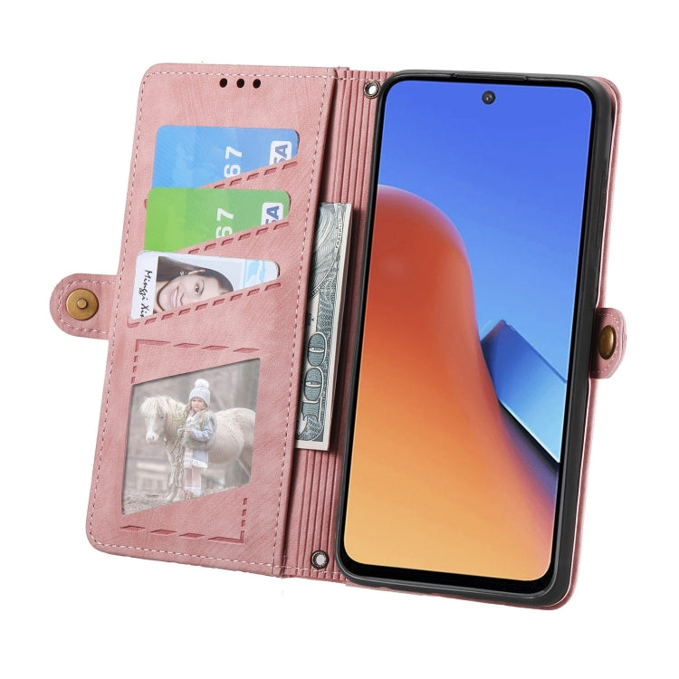 Pink leather phone case wallet with geometric pattern, card pocket, and zipper strap.