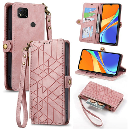 Pink geometric zipper wallet phone case with side buckle, card slots, and wrist strap.