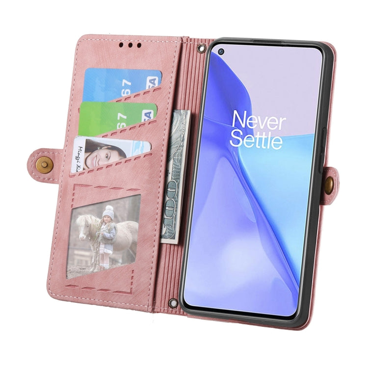 Pink leather folio phone case with zipper pocket, card slots, geometric embossed design