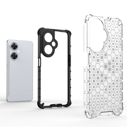 Transparent honeycomb shockproof phone case with black frame and side button cutouts