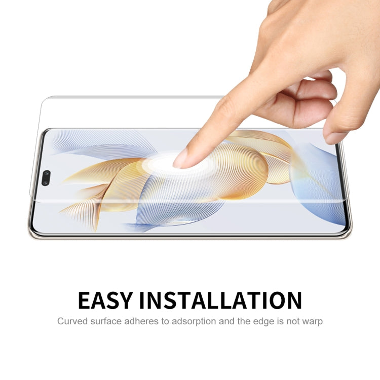 Curved PET screen protector film being smoothed onto smartphone screen