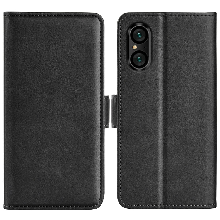 Black leather flip phone case with magnetic buckle and cutout for camera