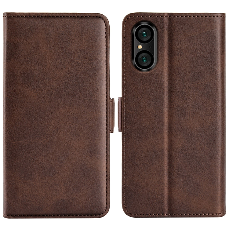 Brown leather flip phone case with magnetic buckle and camera cutout