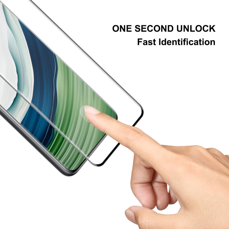 Tempered glass screen protector being aligned and applied to a phone front