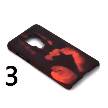 Dark phone case with red discoloration pattern and camera cutout