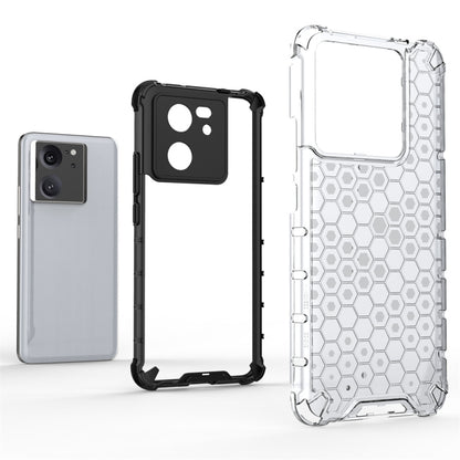 Clear-toned shockproof honeycomb phone case with cutouts for camera and ports.