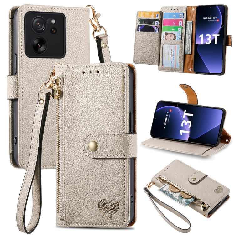 Cream leather wallet phone case with zipper card holder, wrist strap, and fold-out stand