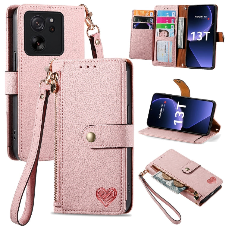 Pink leather wallet phone case with zipper card holder, wrist strap, and fold-out stand