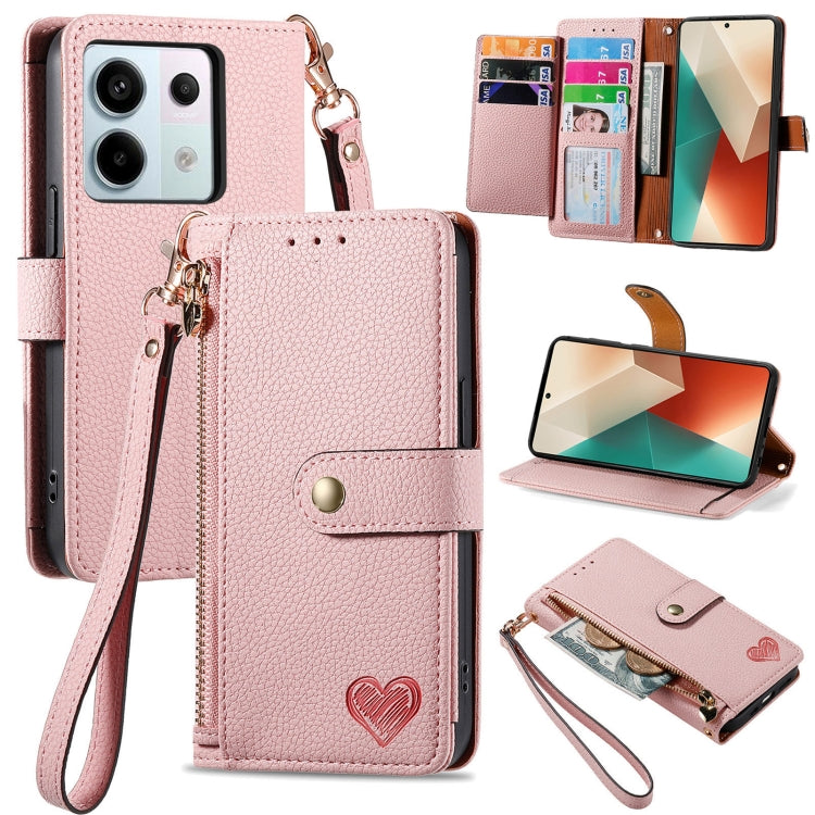 Pink leather wallet phone case with zipper card holder, wrist strap, and fold-out stand