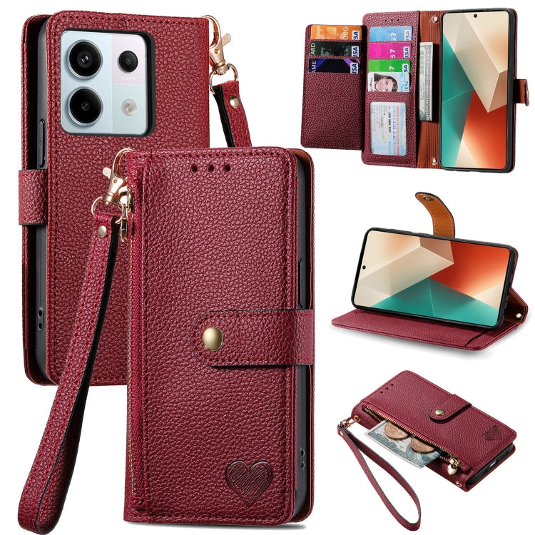 Burgundy leather wallet phone case with zipper card holder, wrist strap, and fold-out stand