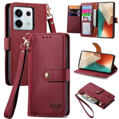 Burgundy leather wallet phone case with zipper card holder, wrist strap, and fold-out stand