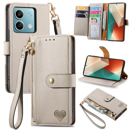 Light beige leather-style phone wallet case with zipper and lanyard strap with heart emblem