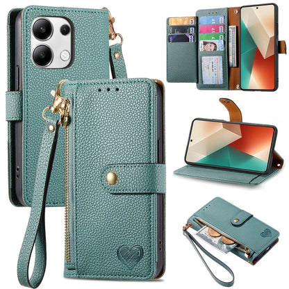 Teal leather phone case with wrist lanyard, card slots, heart strap detail, stand view