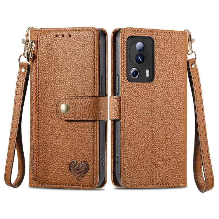 Brown leather phone case with zipper, wrist strap, and card slots for slim phones