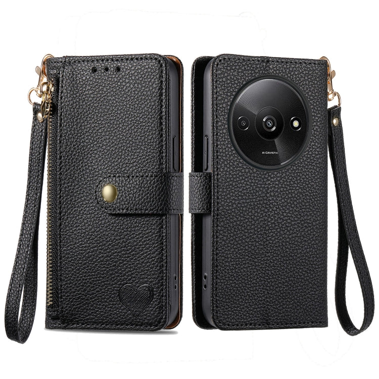 Black leather phone case with wrist lanyard, zipper, and card pocket window, heart emblem