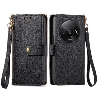 Black leather phone case with wrist lanyard, zipper, and card pocket window, heart emblem