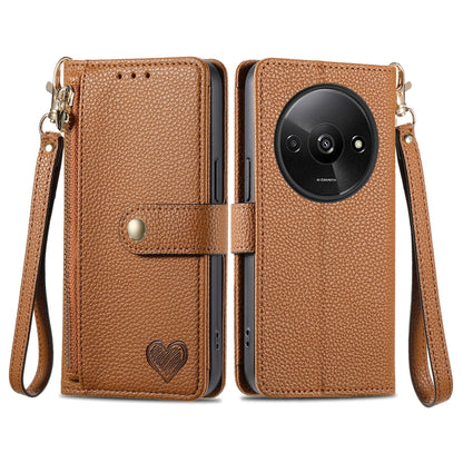Tan leather phone case with wrist lanyard, zipper, and card pocket window, heart emblem