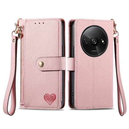 Light pink leather phone case with wrist lanyard, zipper, and card pocket window, heart emblem