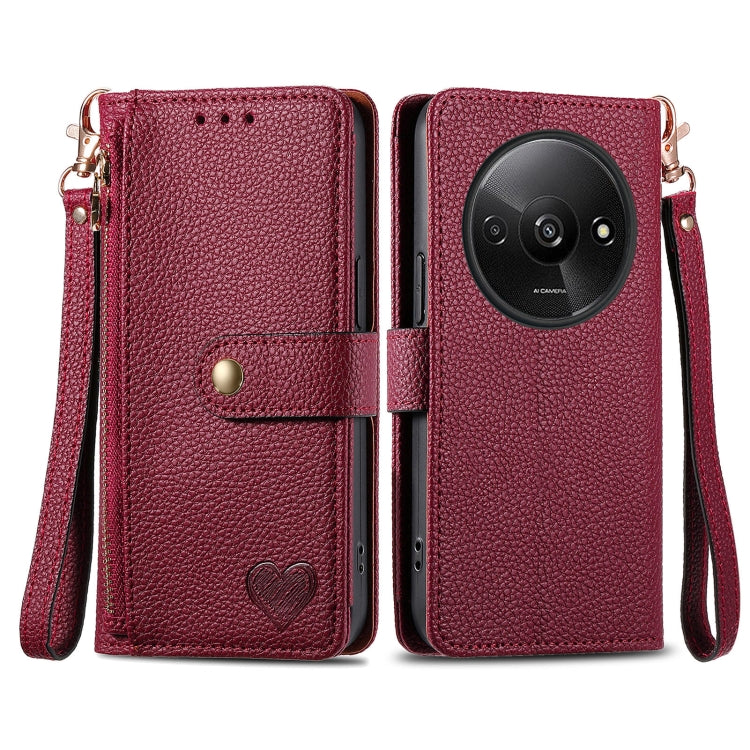 Dark red leather phone case with wrist lanyard, zipper, and card pocket window, heart emblem