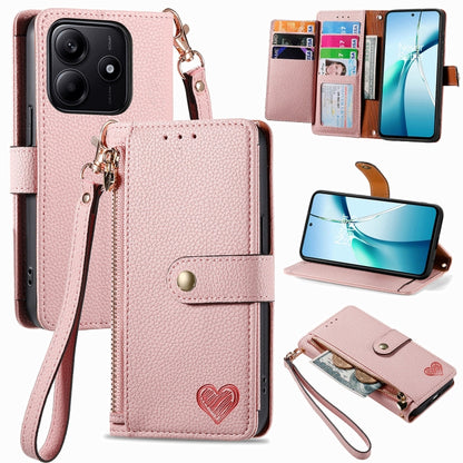 Pink leather wallet-style phone case with zipper pouch, wrist strap, and card slots