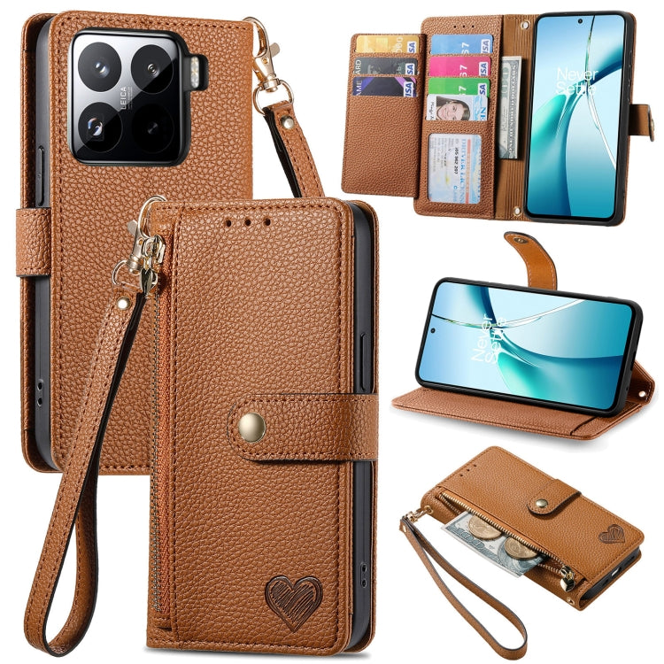 Brown leather phone case with wrist strap, card slots, and heart emblem