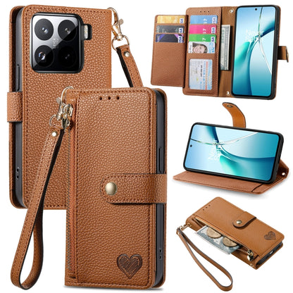 Brown leather phone case with wrist strap, card slots, and heart emblem