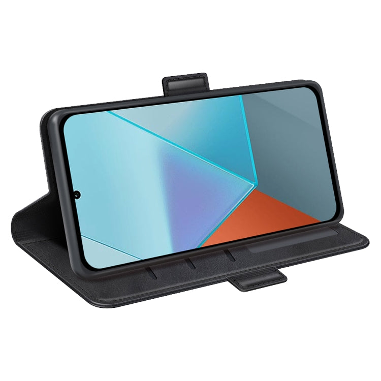 Black leather flip phone case folded as a stand for phone viewing