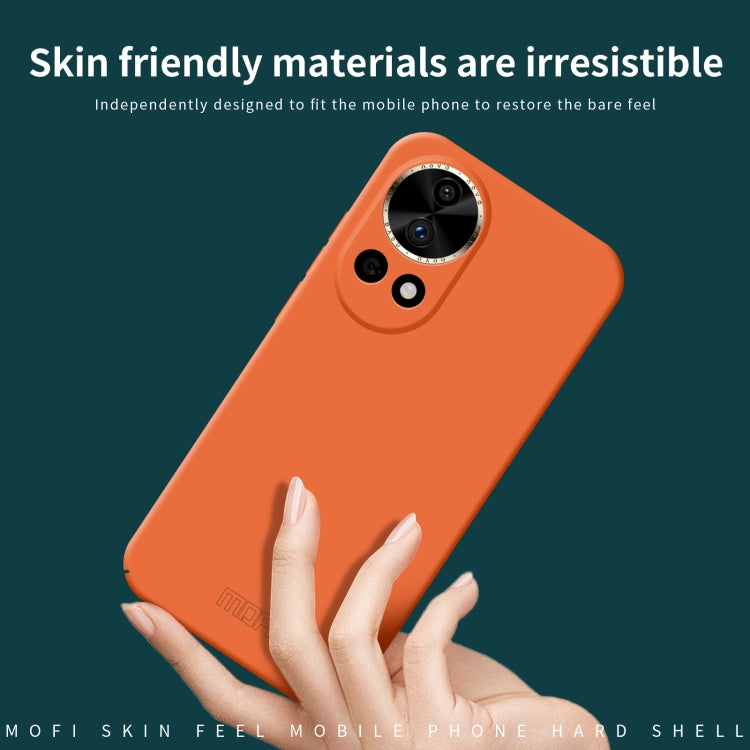 Orange hard phone case with camera cutout; skin-feel matte texture