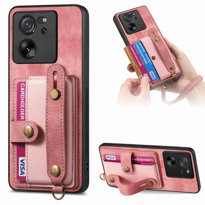 Pink leather-look wallet phone case with wrist strap and card holder